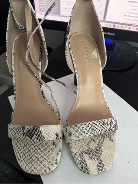 BCBGeneration Snake-Print Ankle-Strap Heels in Cream and Black